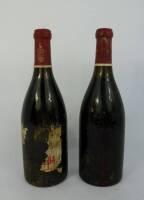 Lote 391 - 2 garrafas de vinho tinto Ferreirinha " Barca Velha " 1965 com rótulos rasgados,danificados pela humidade. Muito bons niveis de vinho