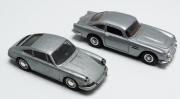 Lote 107 - CARROS - Conjunto de dois carros, 1 Porsche 911 da 2Vitesse" 1/43 e 1 Aston Martin da "Del Prado". Em bom estado de conservação. 1/43