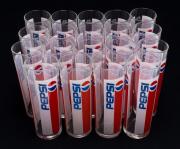 Lote 23 - COPOS DA PEPSI - Conjunto de 19 copos da Pepsi em vidro, para 25 cl. Altura 17 cm e diâmetro 6 cm. Novos com sinais de armazenamento.