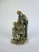 Lote 23 - Sagrada Família revestida a prata laminada bicolor, com 18 cm de altura