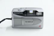 Lote 143 - OLYMPUS - Máquina fotográfica analógica da marca Olympus modelo TripXB41 AF, com bolsa preta. Dimensão: 7x11 cm. Não testada