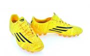 Lote 40 - ADIDAS, CHUTEIRAS DE HOMEM - Modelo Messi F30 AG, Refª M21930, em amarelo e preto, com atacadores amarelos. Tamanho 43 1/3. Nota: sem uso, em caixa de origem