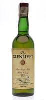 Lote 2618 - WHISKY THE GLENLIVET 12 ANOS - Garrafa de Whisky, Pure Single Malt, Aged 12 Years, George & J. G. Smith, Escócia, (700ml - 40%vol). Nota: garrafa idêntica foi vendida por € 61,98 (£ 55). Rótulo algo danificado. Consultar valor indicativo em ht