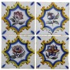 Lote 15 - PAINEL DE 4 AZULEJOS, SÉC. XX - Decoração floral policromada, com reserva recortada em azul e amarelo. Dim: 28,5x28,5 cm. Nota: sinais de uso e manuseamento, azulejos soltos e desiguais. - 3