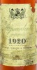 Lote 2051 - AGUARDENTE 1920 - Garrafa de Aguardente Preparada, Envelhecida em Cascos de Carvalho, Carvalho Ribeiro & Ferreira, Lisboa, (1000ml - 40%vol.). Nota: garrafa idêntica à venda por € 35. Rótulo algo danificado. Consultar valor indicativo em https - 3