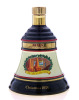 Lote 2797 - WHISKY BELL'S CHRISTMAS 1991 - Garrafa Decanter de Whisky, Old Scotch Whisky, Extra Special, (750ml - 43%vol). Nota: garrafa semelhante à venda por € 96,85 (£ 85,00) conversão ao dia. Em caixa de cartão original. Consultar valor indicativo em  - 2