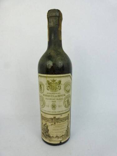 Lote 945 - Lote de 1 garrafa de vinho tinto, Herederos Del Marquês de Riscal Elciego (Alava), colheita de 1943. Vinho de grande qualidade. Para coleccionadores. Nota: com perdas.