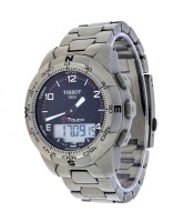 Lote 5102 - TISSOT, RELÓGIO DE PULSO - Modelo Touch Ref. T047420 A, original. Caixa em aço com 43 mm e bracelete em aço. Movimento de quartzo. Mostrador com numeração árabe e quadrante digital multifunções. Relógio idêntico à venda por € 499,99. Nota: sin