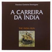 Lote 20 - A CARREIRA DA ÍNDIA, LIVRO FILATÉLICO - Por Francisco Contente Domingues. Editora: CTT, Correios de Portugal, 1998. Edição numerada 7293/10.000. Contém selos. Dim: 24,5x24,5 cm. Encadernação cartonada do editor em tela. Nota: sinais de manuseamento