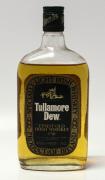 Lote 19 - TULLAMORE DEW - Garrafa antiga de Whisky ( Anos 60/70) - Finest Old Irish Whiskey. Produced by Tullamore Dew Company - Dublin - Ireland. Imported by Wilmerink & Muller, Naarden. (75cl, 40%vol.). Nota: Garrafa idêntica á venda por € 175 . Consultar valor indicativo em https://www.whiskybase.com/whiskies/whisky/97968/tullamore-dew-finest-old-irish-whiskey-1791