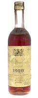 Lote 2195 - AGUARDENTE 1920 - Garrafa de Aguardente Preparada, Envelhecida em Cascos de Carvalho, Carvalho Ribeiro & Ferreira, Lisboa, (750ml - 40%vol.). Nota: garrafa semelhante (1000ml) à venda por € 35. Consultar valor indicativo em https://www.garrafe