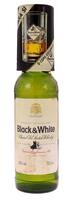 Lote 2235 - WHISKY BLACK & WHITE - Garrafa de Whisky, Choice Old Scotch Whisky, James Buchanan, Escócia, (700ml - 40%vol.). Nota: garrafa antiga com oferta de copo. Garrafa similar foi vendida por € 45,56 (£ 40). Consultar valor indicativo em https://www.