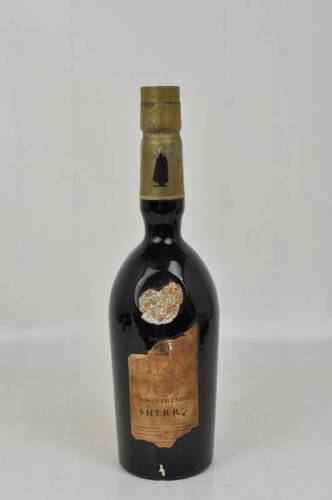 Lote 1317 - Lote de garrafa de Garrafa de "Amontillado" Sherry. Sandeman. Para coleccionador. Nota: rótulo com falhas