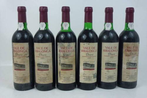 Lote 1596 - Lote de seis garrafas de vinho tinto Vale de Ribalonga, colheita de 1997, Douro. Para coleccionadores. Nota: pequenas falhas e manchas nos rótulos.