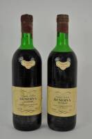 Lote 1615 - Duas garrafas de vinho tinto Sogrape, Reserva de 1977. Para coleccionadores. Nota: falhas nos rótulos. Com perda.