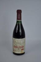 Lote 1735 - Garrafa de Vinho Tinto Barca Velha 1966, Garrafa com valor de venda na Garrafeira Nacional de 395€. O Barca Velha é o símbolo inquestionável da qualidade mais alta dos vinhos do Douro. Clássico, intenso, complexo e elegante – são os adjectivos