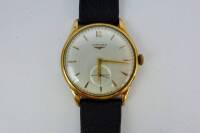 Lote 2728 - Relógio Longines, caixa de Plaquê, modelo clássico. Referencia 6115 8 e calibre 23Z. Relógio em Bom estado e com movimento muito raro. Todo original e com bracelete nova em pele, caixa com 34mm de diâmetro