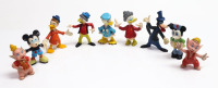 Lote 168 - 9 FIGURINHAS VINTAGE DA DISNEY - Conjunto de nove figurinhas coleccionáveis da Disney dos anos 70 de plástico moldado e pintado. Altura média: 5cm. Com pequenas falhas e defeitos