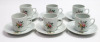 Lote 214 - CHÁVENAS DE CAFÉ - seis chávenas de café com respetivos pires em porcelana Eva Decor, estampadas com motivos florais policromados, marcadas na base. Bom estado geral