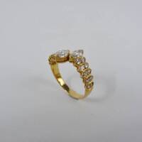 Lote 2767 - Anel de Alta Joalharia Portuguesa em ouro amarelo (contraste português 800 (19.2K ) cravejado com dois brilhantes em talhe navete com aprox. 0.62 ct cada (total: 1.64 ct com pureza SI1 e cor H) e 20 diamantes a adornar em talhe brilhante redon