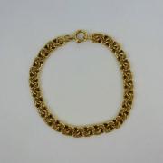 Lote 2919 - Pulseira de ouro 19,2k contrastado, malha dupla batida, com 21cm de comprimento e o peso total de 25,1gr