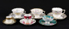 Lote 33 - CHÁVENAS DE CHÁ E CAFÉ EM PORCELANA - Conjunto de chávenas com pires com diversas marcas e decorações sendo 3 chávenas de chá e 3 chávenas de café. Dim: entre 4x4 cm e 7x8 cm (chávenas)