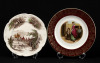 Lote 54 - PRATOS DECORATIVOS EM FAIANÇA INGLESA - Conjunto de 2 pratos marcados na base, Made in England, um Johnson Bros., decoração "Haddon Hall" e outro Royal Falcon, decoração "Life Ware". Dim: 25 cm (maior)