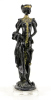 Lote 101 - FIGURA FEMININA - Estatueta em resina ao estilo art deco, decoração relevada em preto com ornamentos em dourado, assente em base de acrílico. Dim: 36x10x10 cm