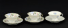 Lote 132 - VISTA ALEGRE, CHÁVENAS DE CHÁ - Conjunto de 3 chávenas com pires em porcelana marcada na base (1924-1947) e (1947-1968), decoração floral policromada com frisos dourados. Dim: 15 cm (pires)