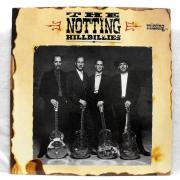 Lote 1463 - LP de vinil - The Notting Hillbillies - Missing...Presumed having a good time, 1990 Phonogram, Nota: em estado entre Bom e Muito Bom