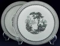 Lote 573 - WM. ADAMS & SONS, PRATOS EM FAIANÇA INGLESA - Par de pratos marcados na base, decoração "Minuet" em cor preta com paisagem e figura feminina. Dim: 25 cm (diâmetro)