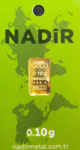 Lote 7 - BARRA DE OURO 999,9 - Barra de ouro 99,9% de 0,10 g, Nadir Gold Fine gold em invólucro selado, numerado e certificado de autenticidade emitido pela NADIR METAL Rafineri, NMR Melter Assayer. Peso: 0.10 g. http://www.lbma.org.uk/pricing-and-statist