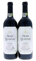 Lote 553 - DUAS QUINTA RESERVA 1991 - 2 garrafas de Vinho Tinto, Reserva 1991, Douro DOC, Adriano Ramos Pinto, Vila Nova de Gaia, (750ml - 12%vol.). Nota: conjunto com um valor de venda de € 119,80. Consultar valor indicativo unitário em https://t.ly/hLUP