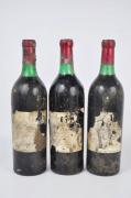 Lote 2114 - Três garrafas de vinho tinto Ferreirinha "Vinha Grande", colheita de 1974". Nota: Rótulos danificados.