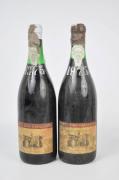 Lote 2338 - Duas garrafas de vinho tinto do Dão "Porta de Cavaleiros" Reserva selecionada 1975. Nota: rótulos e lacre com falhas.
