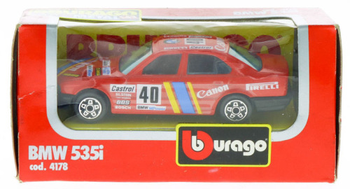 Lote 21 - BBURAGO, BMW 535i - Miniatura automóvel à escala 1:43 em metal encarnado. Bburago. Nota: em caixa original