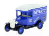 Lote 89 - COLECÇÃO DN "DAYS GONE", CHEVROLET VAN (1928) - Miniatura automóvel à escala 1:43 em metal azul com propaganda da Nivea. Lledo. Nota: em caixa original - 2