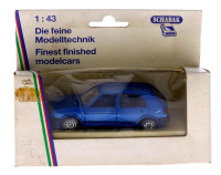 Lote 108 - SCHABAK, VOLKSWAGEN GOLF - Miniatura automóvel à escala 1:43 em metal azul. Schabak. Nota: em caixa original