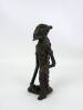 Lote 2922 - Estatueta em ferro da tribo africana DOGON do Mali, com imagem erótica, com 15 cm de altura. Nota: A tribo Dogon é um povo que habita o Mali e o Burkina Faso. Os dogons do Mali são conhecidos como o "povo das estrelas", que vivem numa remota r