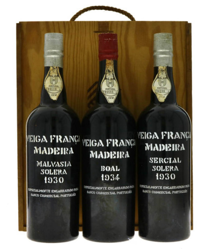 Lote 119 - MADEIRA VEIGA FRANÇA 1930 E 1934 - 3 garrafas de Vinho da Madeira sendo 1 garrafa Sercial Solera 1930, 1 garrafa Malvasia Solera 1930 e 1 garrafa Boal 1934, Especialmente engarrafado para o Banco Comercial Português, (750ml). Nota: conjunto cm 