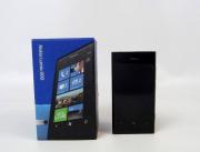 Lote 119 - Telemóvel da marca NOKIA, modelo Lumia 800, usado a funcionar e em bom estado geral, apenas com carregador, sem manuais de instruções e outros acessórios