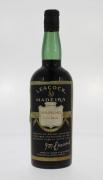 Lote 1275 - Garrafa de vinho da Madeira, Leacock Verdelho, Meio Seco, apresenta perda