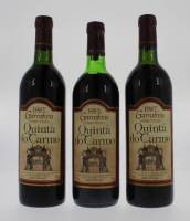 Lote 1452 - Três garrafas de vinho tinto da Região do Alentejo, da marca Quinta do Carmo, duas da garrafeira de 1987 e uma da garrafeira de 1985 esta ultima apresenta ligeira perda