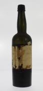 Lote 1497 - Garrafa de Moscatel, Colheita de 1914, (Joaquim Pina?) de Seabra & Sobrinhos, apresenta perda