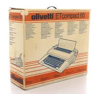 Lote 287 - OLIVETTI, MÁQUINA DE ESCREVER ELÉCTRICA - Modelo ET Compact 65, com visor e teclado AZERT. Made in Singapura. Dim: 13x52x40 cm. Nota: sinais de uso, não testada, caixa de origem