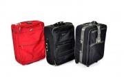 Lote 13 - Conjunto de 3 malas de viagem de diversas marcas, uma da marca Samsonite de cor vermelha e 2 pretas, todas com pega e rodas e cerca de 53cm de altura. Nota: usadas com sinais de uso e alguns defeitos