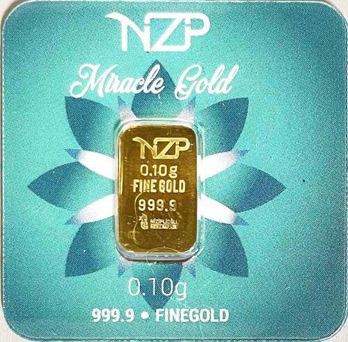 Lote 4 - BARRA DE OURO 999,9 - Barra de ouro 99,9% de 0,10 g, NZP "Miracle Gold" em invólucro selado e certificado de autenticidade emitido pela Niziplioglu Metal Rafineri. Peso: 0.10 g. http://www.lbma.org.uk/pricing-and-statistics 