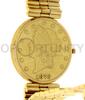 Lote 1 - CORUM, RELÓGIO DE PULSO - Modelo Moeda de 20 Dollares, caixa em ouro 750 com 35 mm feita com moeda de 20 Dollars em ouro de 1876 e bracelete em ouro 750. Movimento de quartzo. Mostrador com a face da moeda sem marcadores. Relógio idêntico á venda - 2