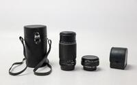 Lote 75 - LENTES - lentes para máquina fotográfica, lente SMC Pentax-M 1:4 200mm, e Hama Telekonverter "Auto 2X"/MD, ambas com tampas e em bolsas de couro sintético preto