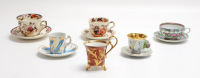 Lote 109 - COLEÇÃO DE CHÁVENAS - coleção de chávenas com pires diversas em porcelana, 2 em porcelana inglesa Mason's estampadas com decoração floral "Mandarim", uma em porcelana de Macau, 1 em porcelana portuguesa Pac pintada à mão com motivos florais e d